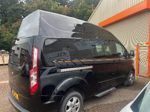 Black van with camper convesion